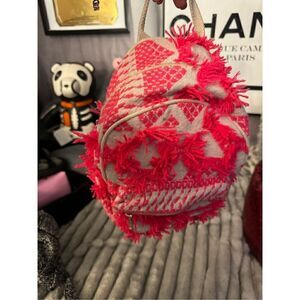 Neon red/pink boho festival backpack bag made in india